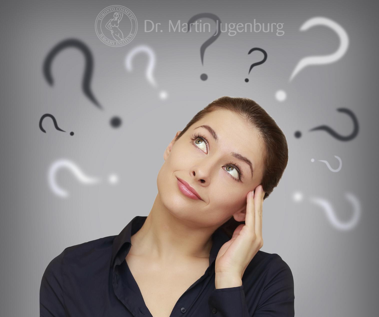 woman tilting her head with question marks