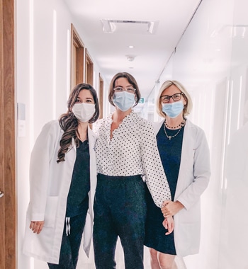 surgical team with masks on nurse surgeon admin