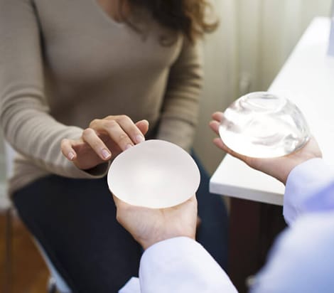 implant touch test feel silicone saline breast implants